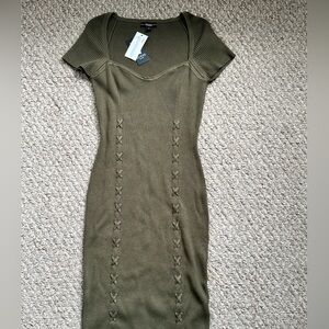 Guess dark green body con dress in the size XL. Brand New.